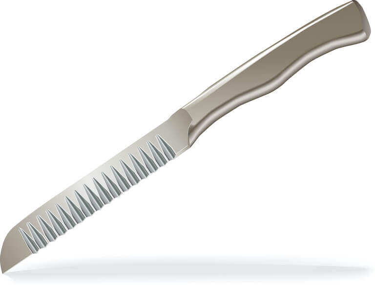 Closeup of a decorating knife on white background.