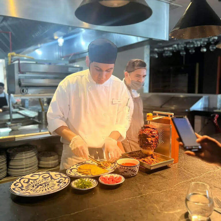 Oscar assembling his entries into the taco al pastor competition.